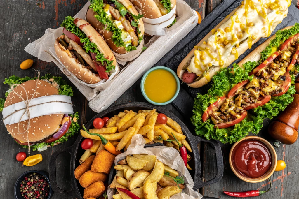 American Fast Food Hamburgers French Fries Hot Dogs Fast Food Unhealthy Eating Concept Top View 1024x683
