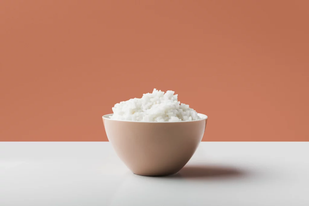 Cooked White Boiled Rice Bowl White Table Against Brown Background