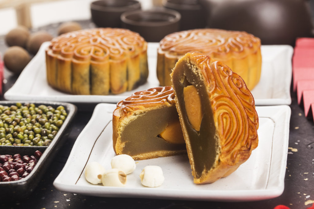 Midautumn Festival Concept Traditional Mooncakes Table With Teacup