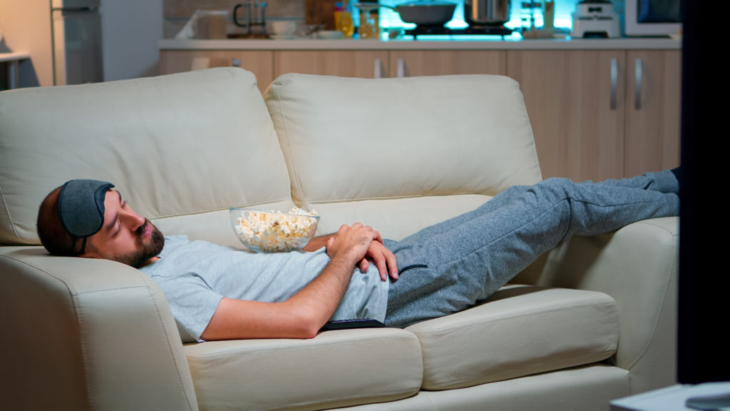 Man Closing His Eye Falling Asleep Couch Living Room 1024x576
