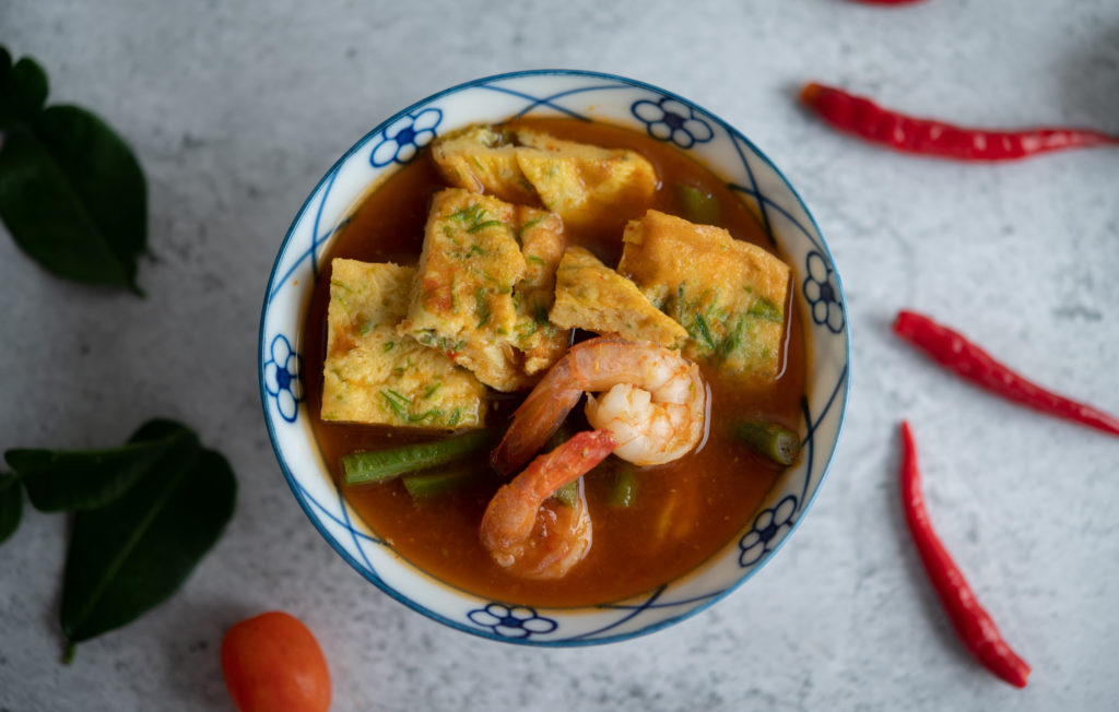 Hot Sour Soup With Cha Om Egg Shrimp White Bowl With Chili Kaffir Lime Leaves White Surface 1024x652
