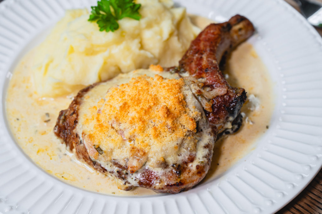 Din Restaurant and Bar Pork Chop In Creamy Mushroom Sauce With House Mashed Potato 