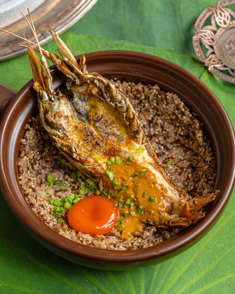 The Square Novotel Siam Square
ข้าวอบคานิมิโสะกุ้งแม่น้ำเผาและไข่แดงดอง (Grilled River Prawn with Kanimiso Mixed Grain Rice)