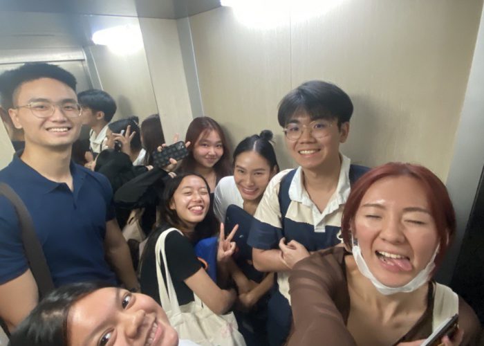 7 of us squeezed into the tiny building elevator.. 555
